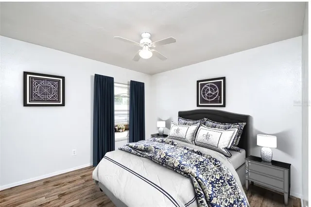 a en suite bathroom with a toilet sink and mirror