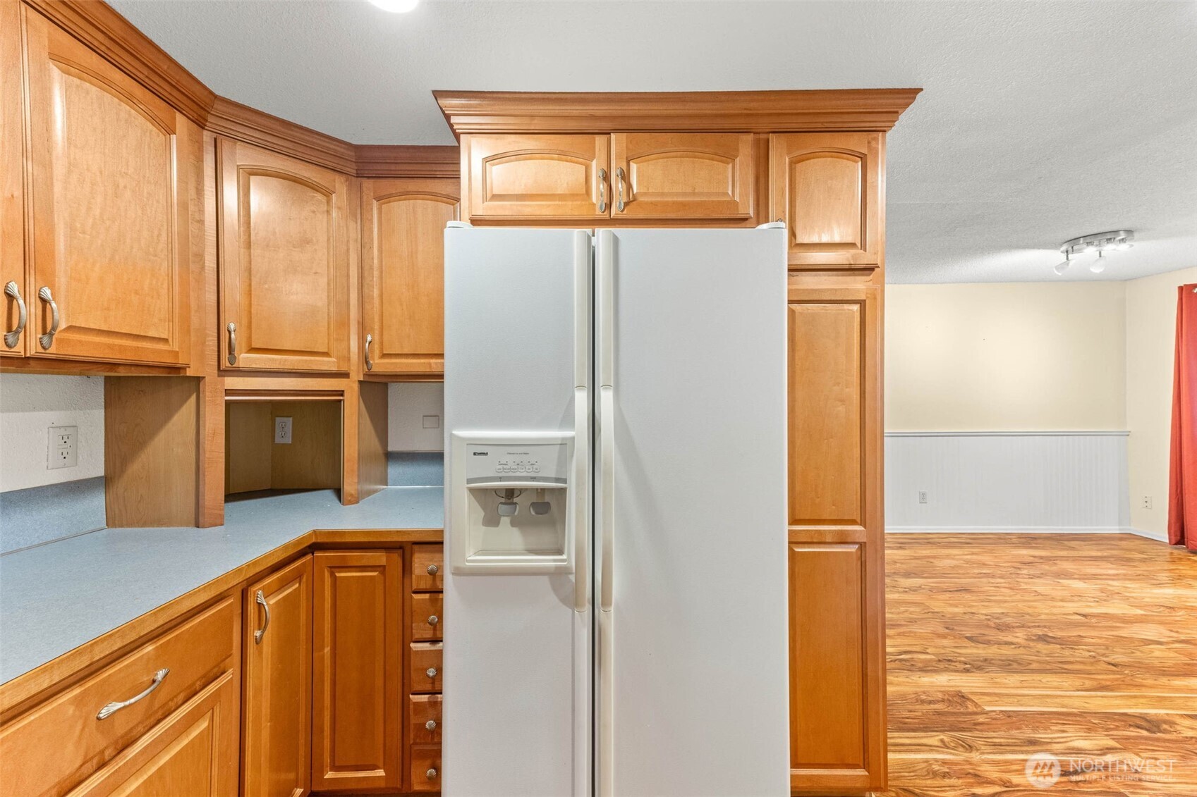 8529 37th Court Southeast Lacey, WA 98503 - Photo 12 of 34 a kitchen with stainless steel appliances granite countertop a refrigerator and a stove top oven