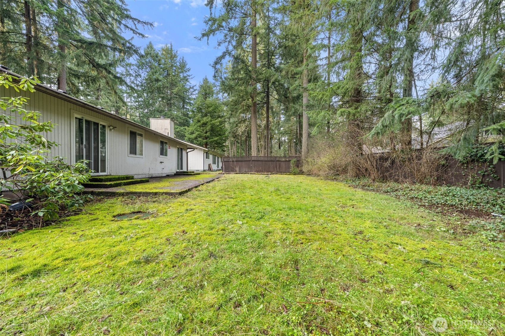 8529 37th Court Southeast Lacey, WA 98503 - Photo 27 of 34 a view of house with backyard