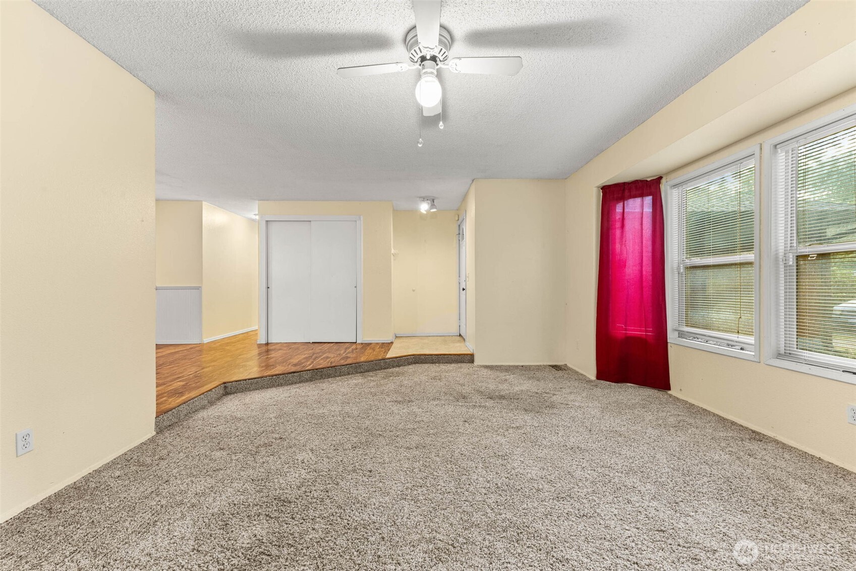 8529 37th Court Southeast Lacey, WA 98503 - Photo 5 of 34 a view of an empty room with a window