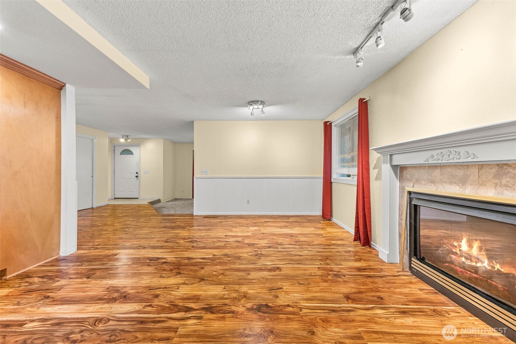 8529 37th Court Southeast Lacey, WA 98503 - Photo 9 of 34 a view of an empty room and fire place
