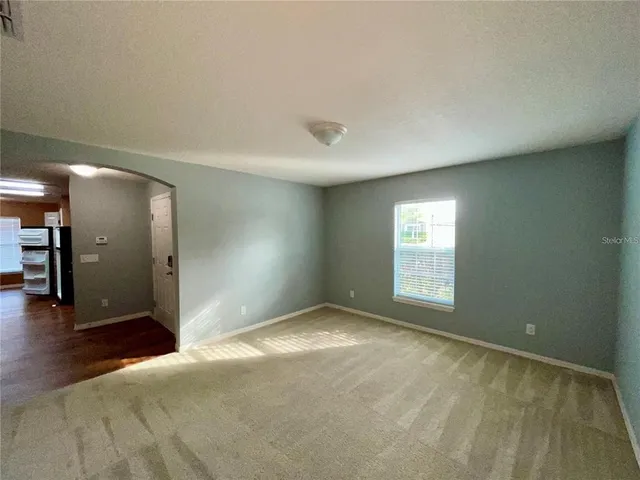 an empty room with window