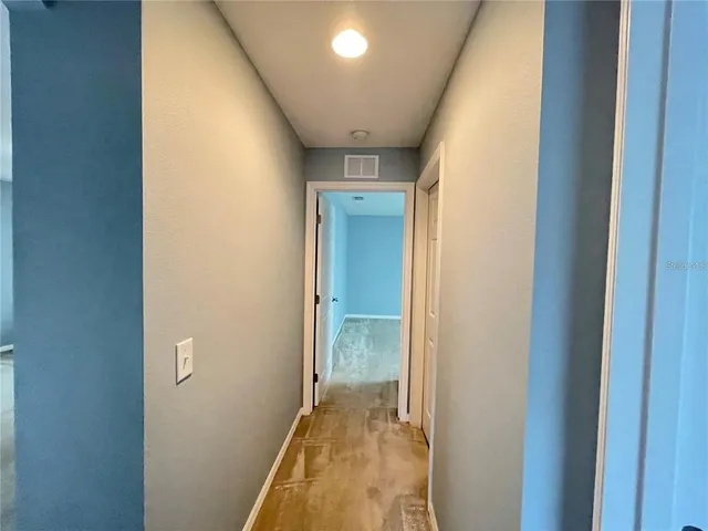 a view of hallway with shower