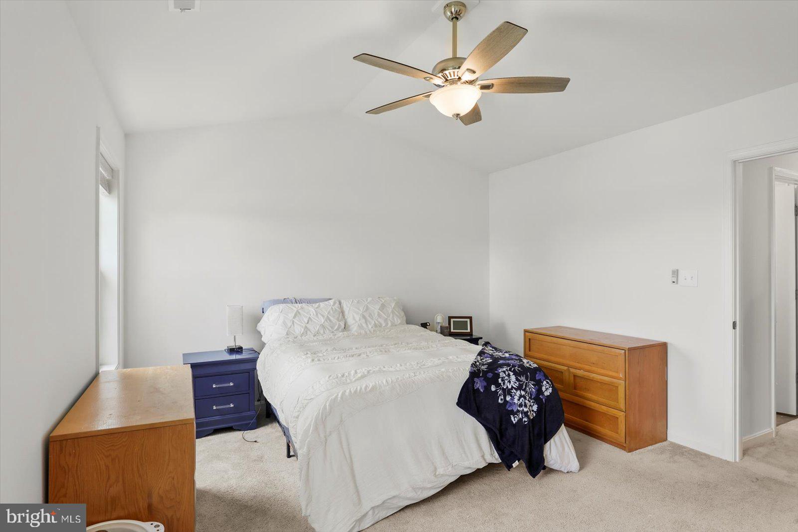 103 Overlook Dr. Hanover, PA 17331 - Photo 21 of 39 a bedroom with a bed and a chandelier