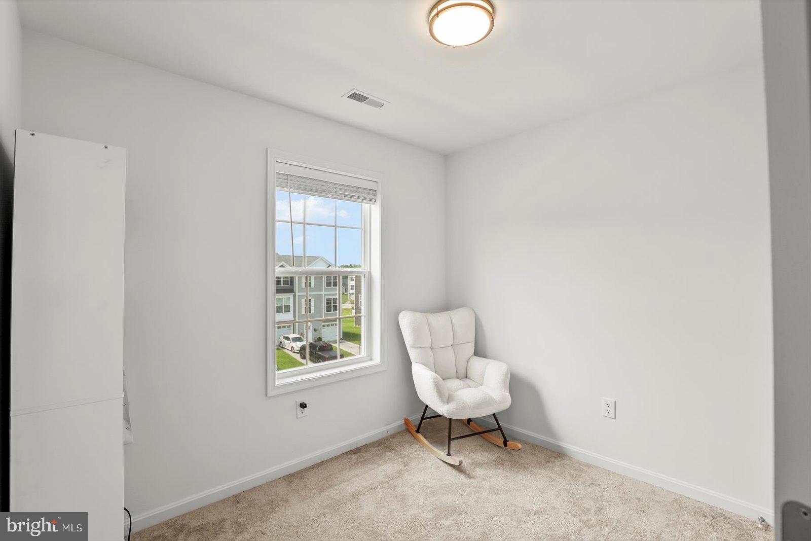 103 Overlook Dr. Hanover, PA 17331 - Photo 28 of 39 a room with a chair and a window