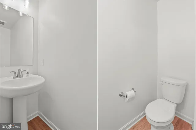 a picture of a bench in a white wall