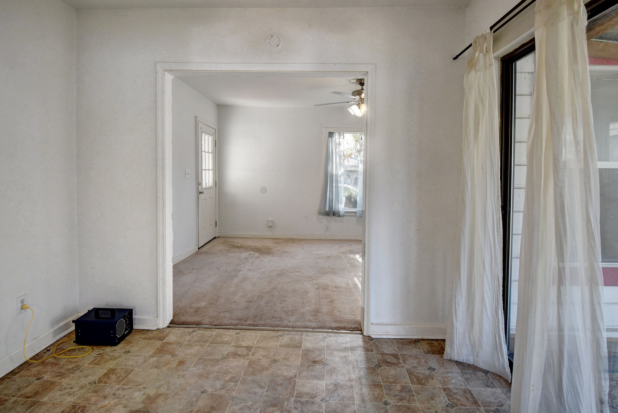 304 Cedar Street Bastrop, TX 78602 - Photo 14 of 33 an empty room with windows