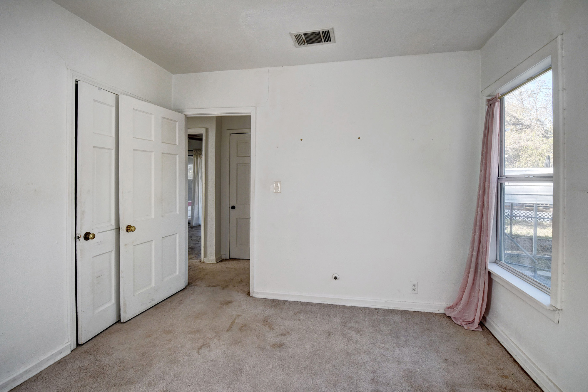 304 Cedar Street Bastrop, TX 78602 - Photo 22 of 33 a view of room with window and hallway