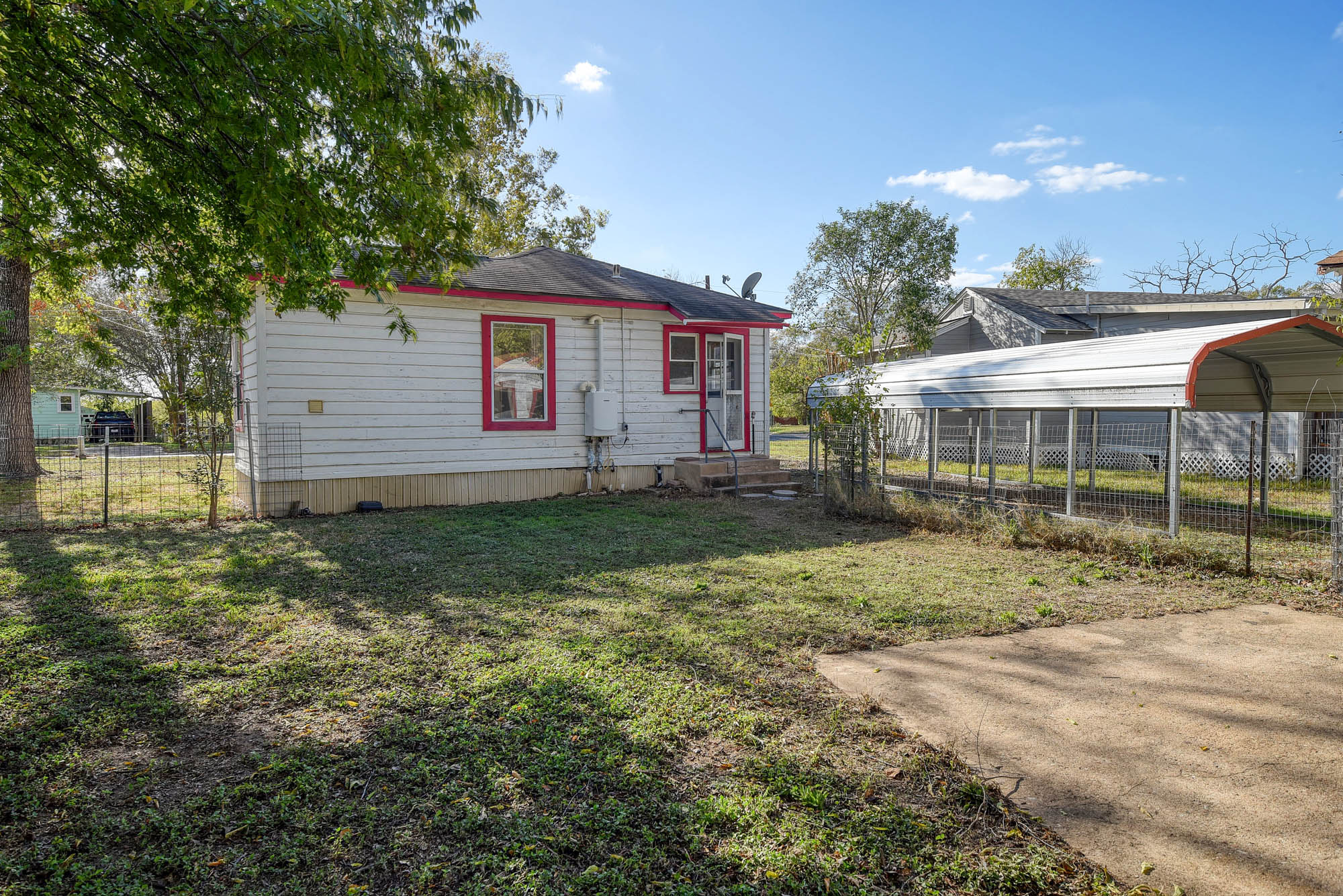 304 Cedar Street Bastrop, TX 78602 - Photo 30 of 33 a view of a house with a yard