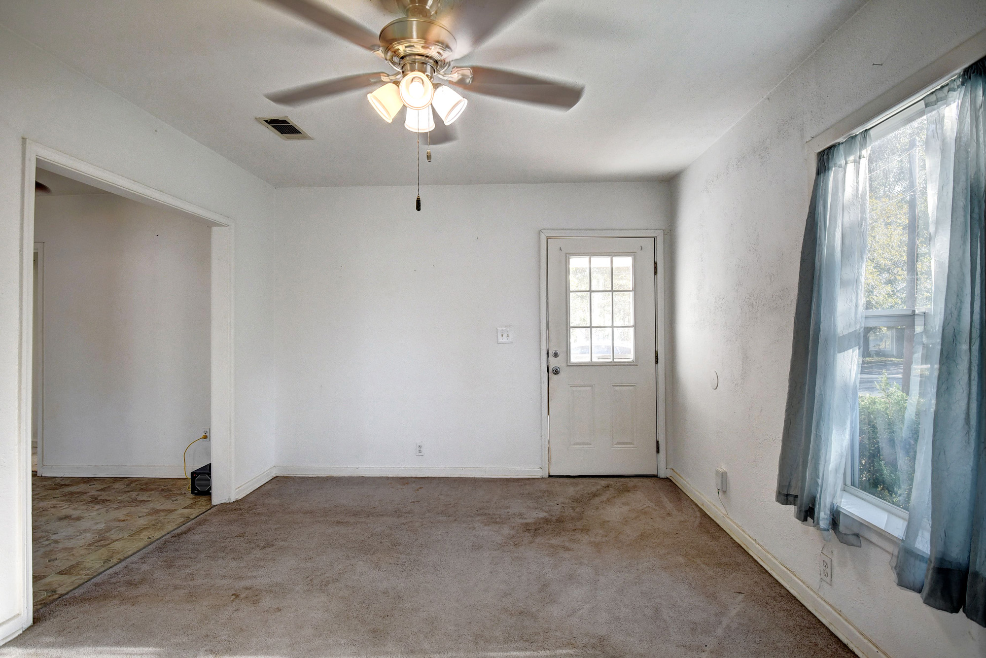 304 Cedar Street Bastrop, TX 78602 - Photo 8 of 33 a view of an empty room with a window