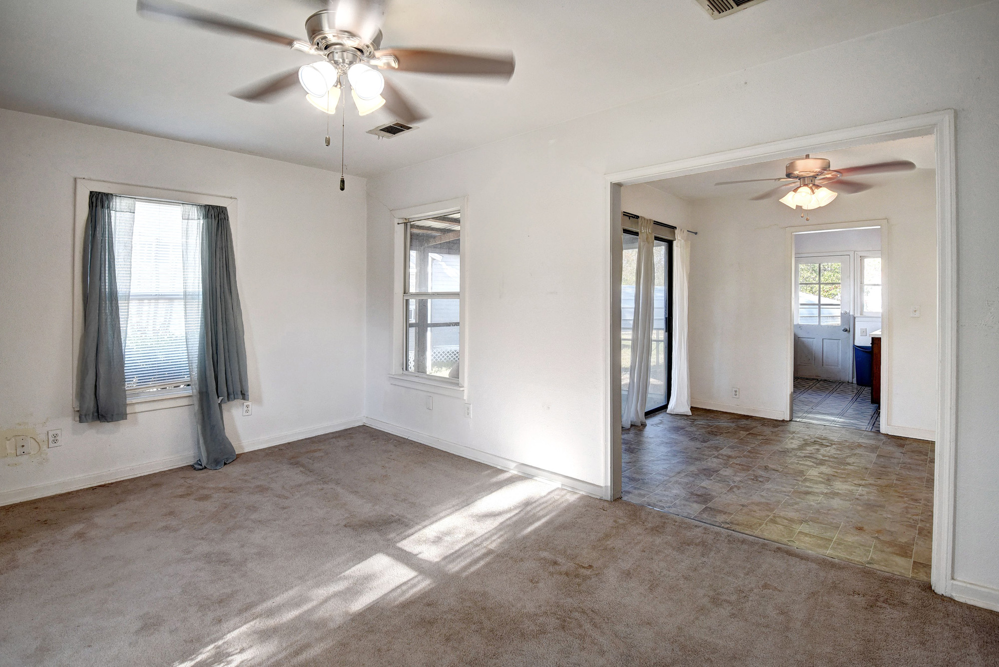 304 Cedar Street Bastrop, TX 78602 - Photo 10 of 33 wooden floor in an empty room with a window