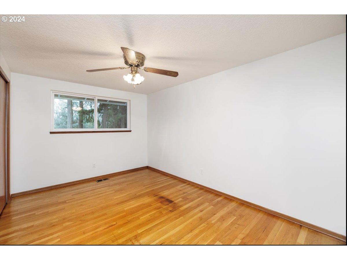 13400 Northwest Northrup Street Portland, OR 97229 - Photo 20 of 39 a view of an empty room with a window