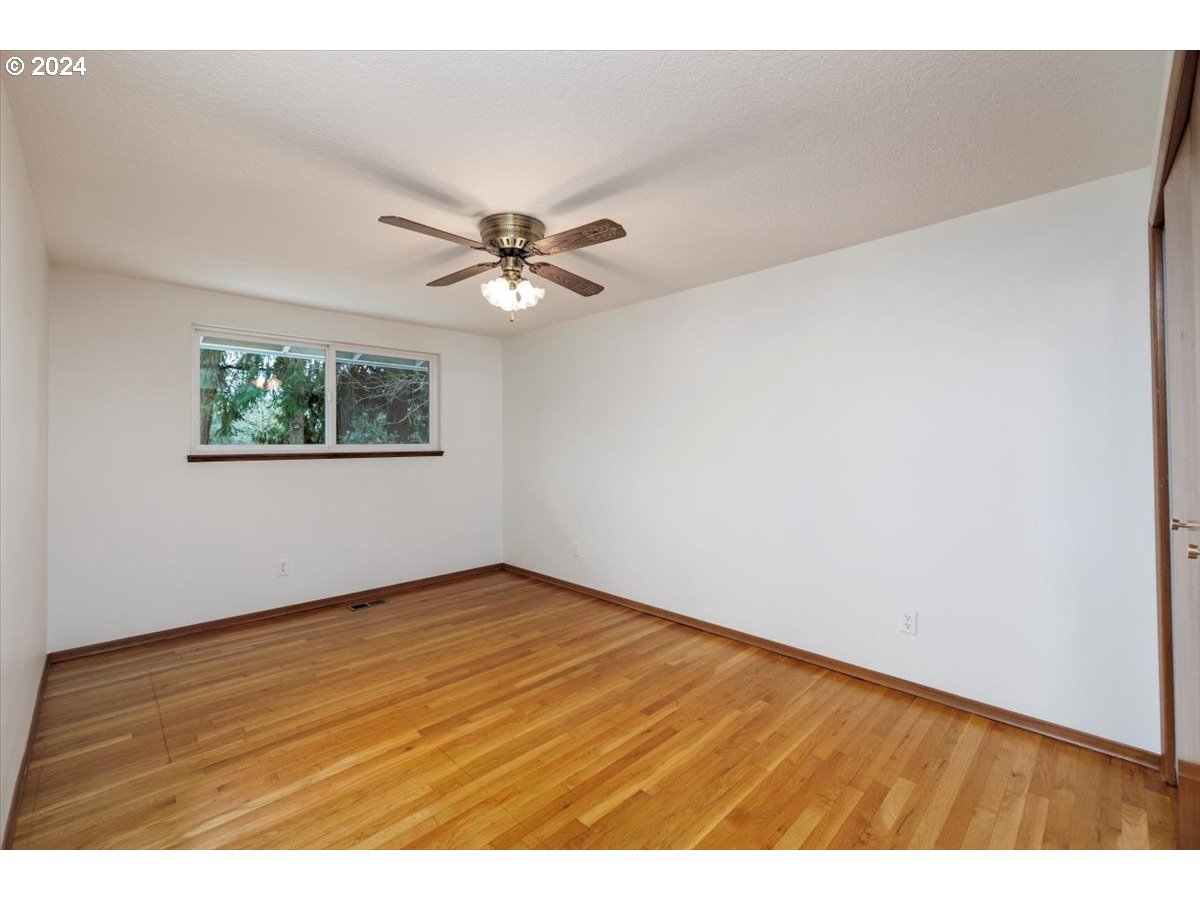 13400 Northwest Northrup Street Portland, OR 97229 - Photo 22 of 39 a view of an empty room with a window