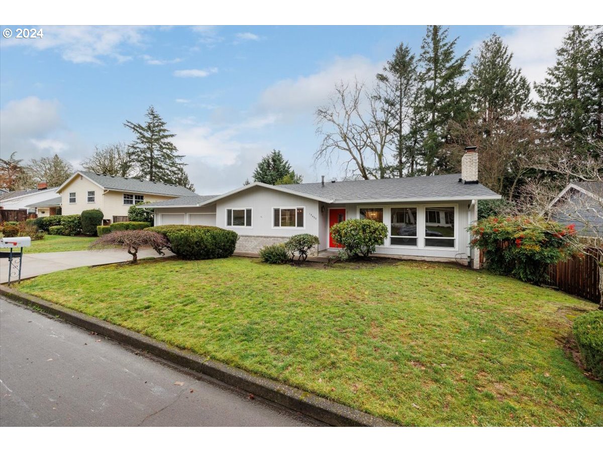 13400 Northwest Northrup Street Portland, OR 97229 - Photo 3 of 39 a front view of a house with a garden
