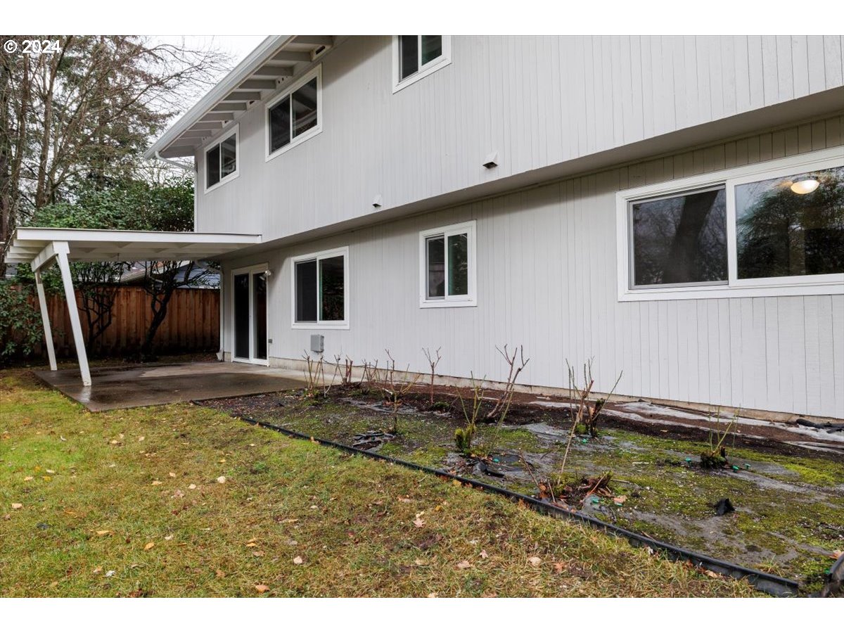 13400 Northwest Northrup Street Portland, OR 97229 - Photo 36 of 39 a backyard of a house with garden and patio