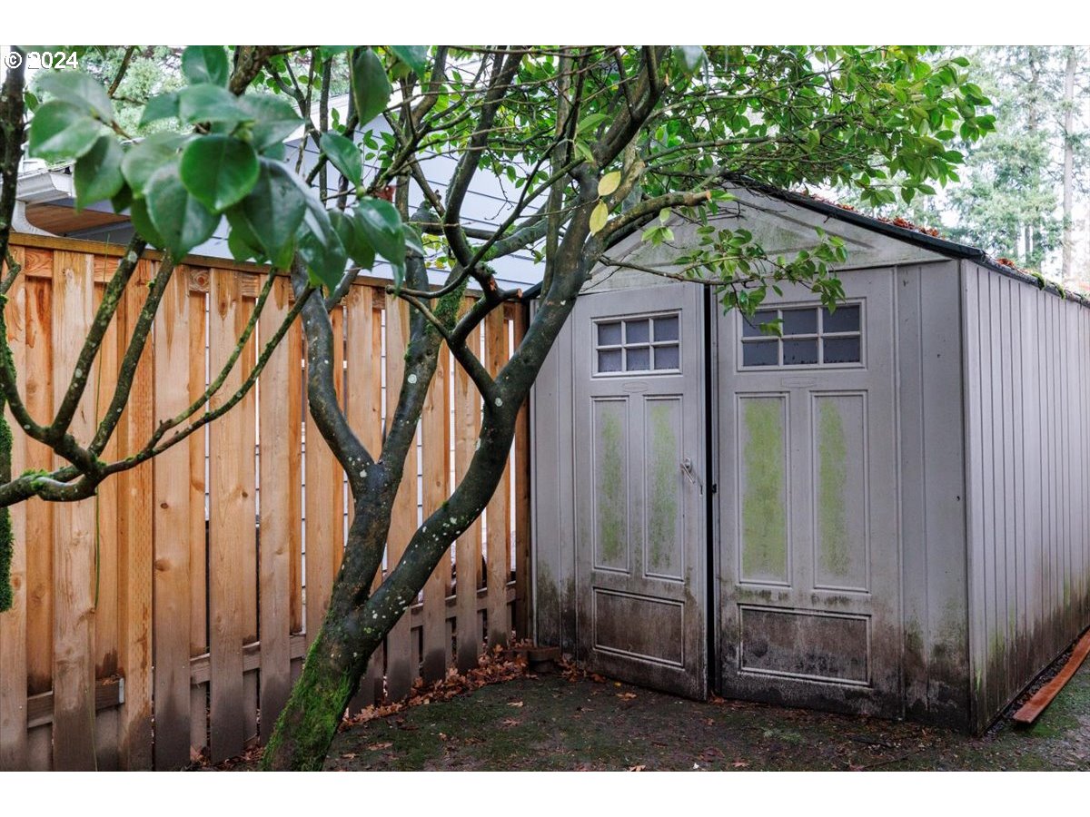 13400 Northwest Northrup Street Portland, OR 97229 - Photo 37 of 39 a backyard of a house with lots of green space