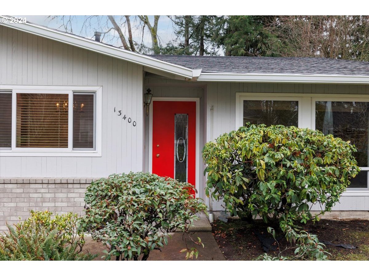 13400 Northwest Northrup Street Portland, OR 97229 - Photo 4 of 39 a view of a house with potted plants