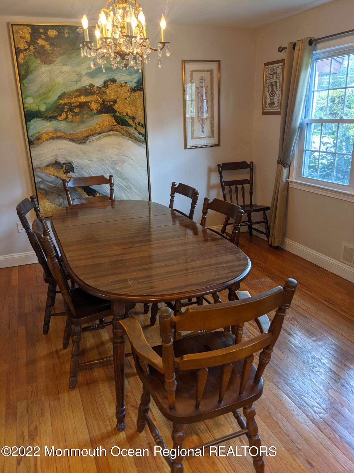 1304 Franklin Avenue Asbury Park, NJ 07712 - Photo 14 of 25 a dining room with furniture and window