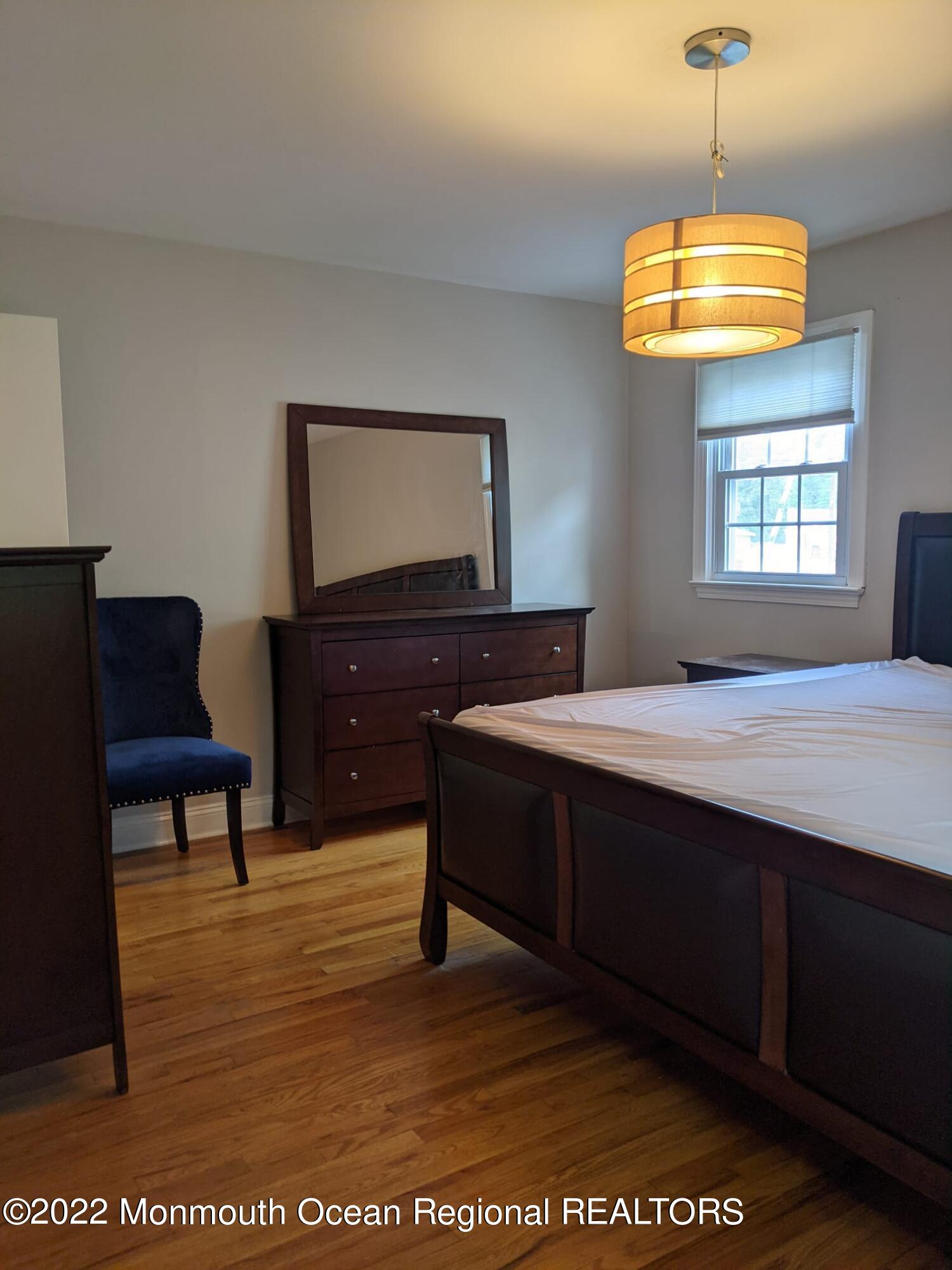 1304 Franklin Avenue Asbury Park, NJ 07712 - Photo 20 of 25 a living room with furniture and a window