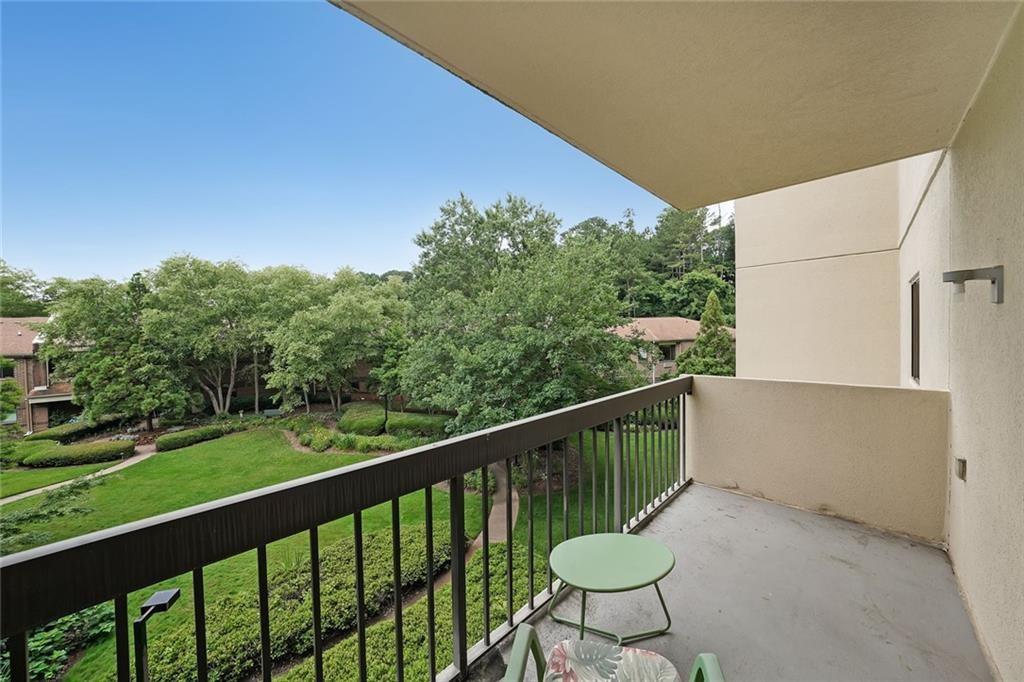 1800 Clairmont Lake, Unit A313 Decatur, GA 30033 - Photo 17 of 40 a view of a chairs and table in the balcony