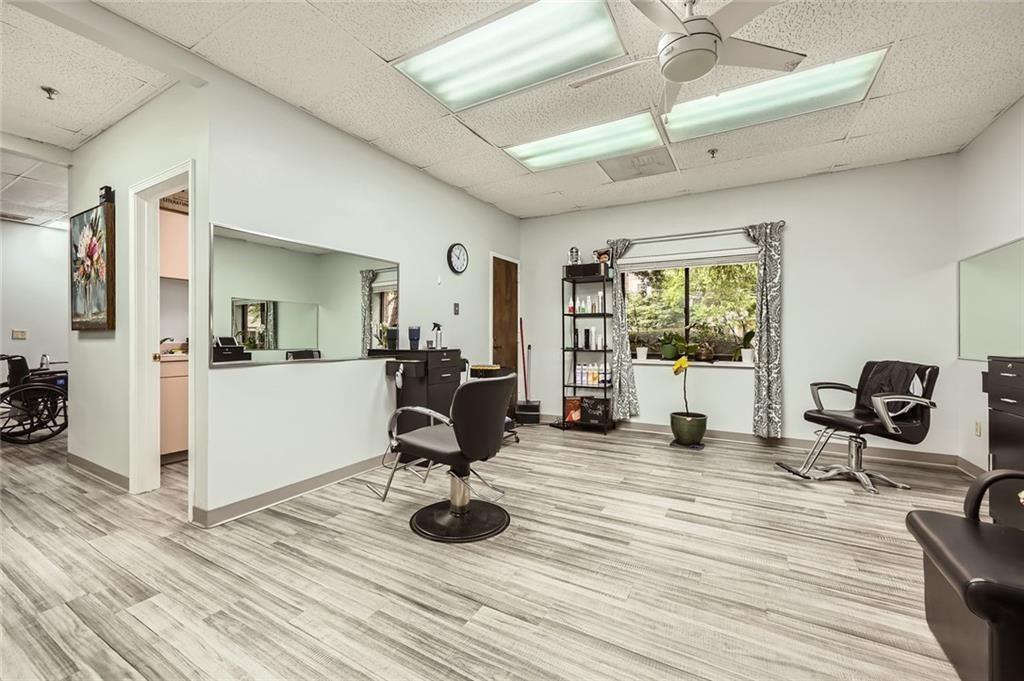 1800 Clairmont Lake, Unit A313 Decatur, GA 30033 - Photo 24 of 40 a view of a livingroom with furniture and a flat screen tv
