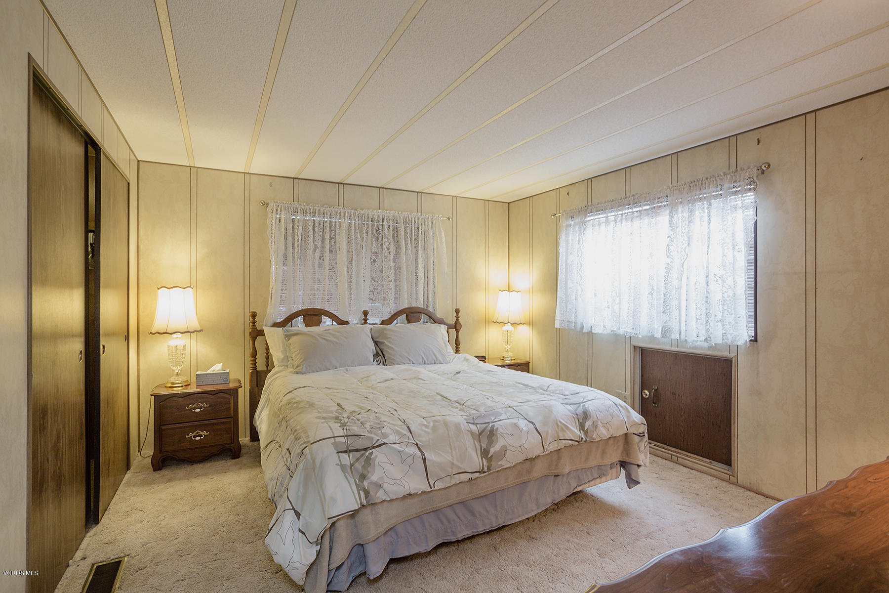 6480 Katherine Road, Unit 3 Simi Valley, CA 93063 - Photo 15 of 28 a bedroom with a bed and a window