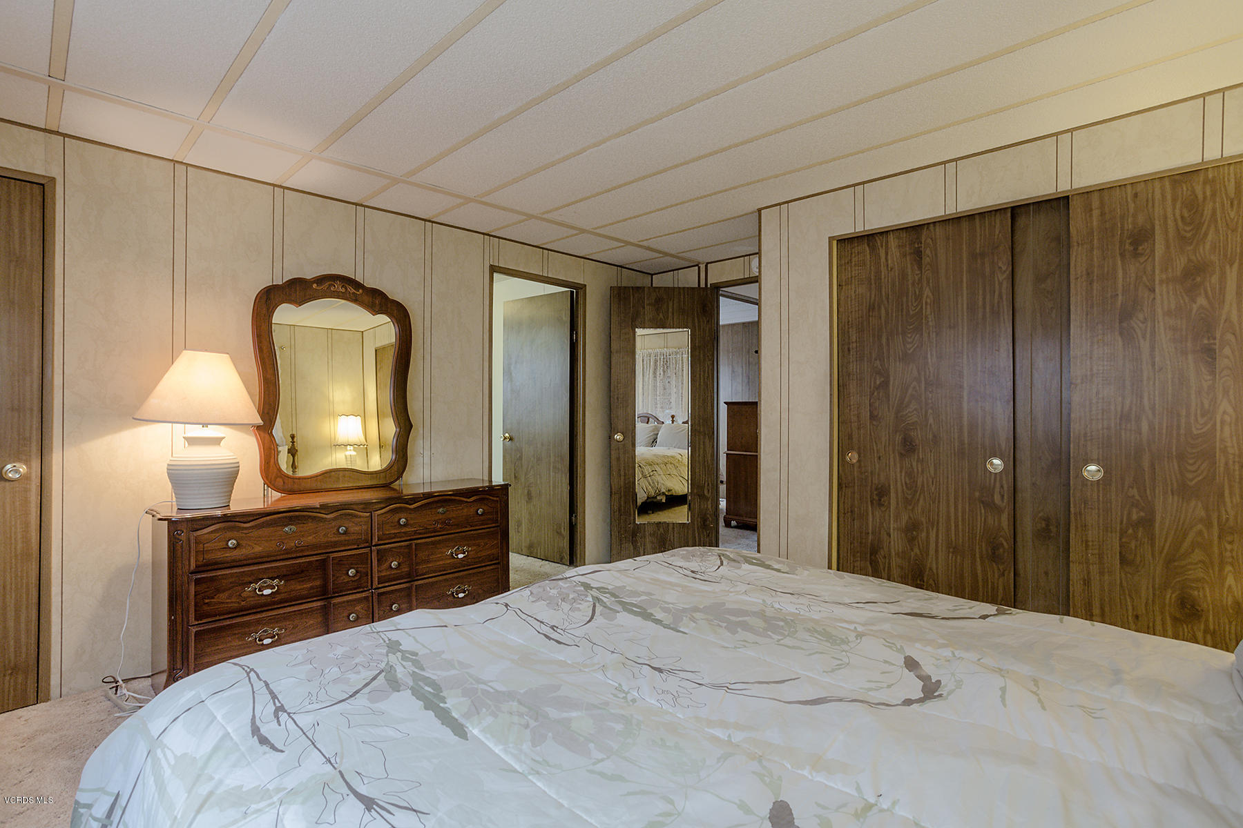 6480 Katherine Road, Unit 3 Simi Valley, CA 93063 - Photo 16 of 28 a bedroom with a bed and a dresser