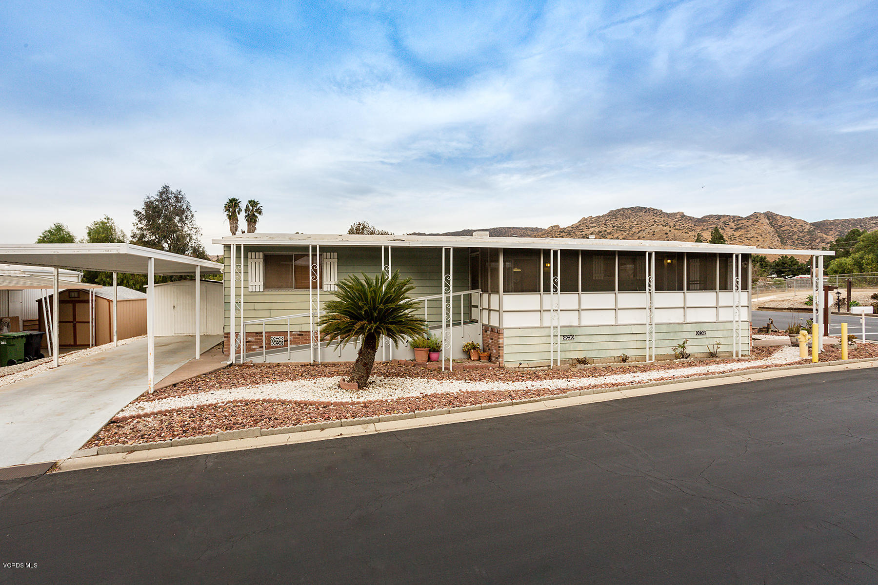6480 Katherine Road, Unit 3 Simi Valley, CA 93063 - Photo 3 of 28 a view of house with swimming pool and porch