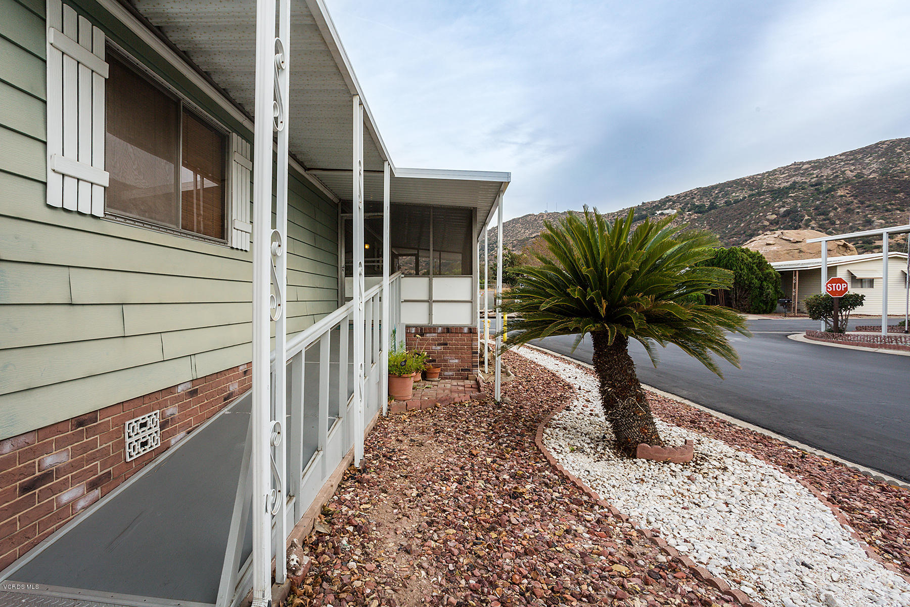 6480 Katherine Road, Unit 3 Simi Valley, CA 93063 - Photo 4 of 28 a house view with a backyard space