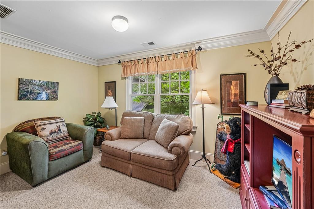 14 Laurel Ridge Lane Big Canoe, GA 30143 - Photo 34 of 72 a living room with furniture and a large window
