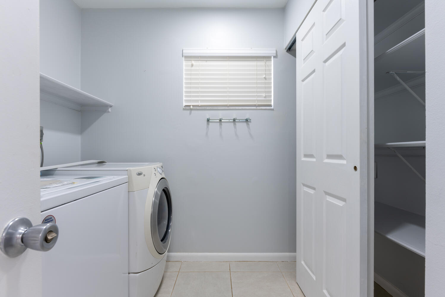 4695 Brandywine Drive Boca Raton, FL 33487 - Photo 21 of 28 a utility room with dryer and washer