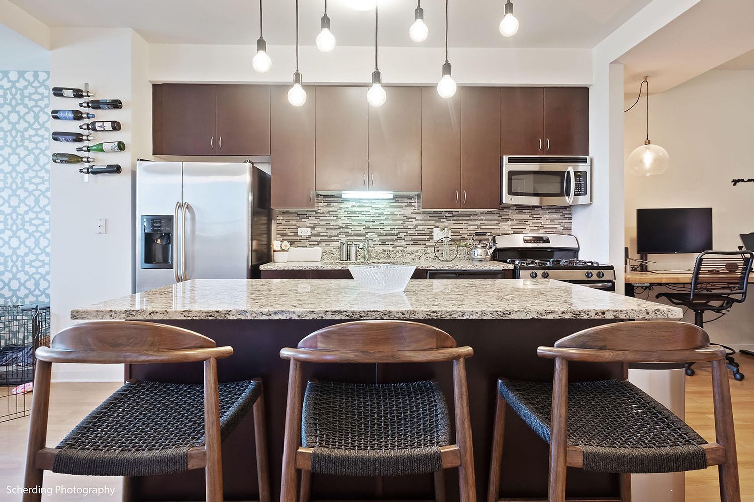 437 West Division Street, Unit 806 Chicago, IL 60610 - Photo 2 of 18 a kitchen with granite countertop lots of counter top space and stainless steel appliances