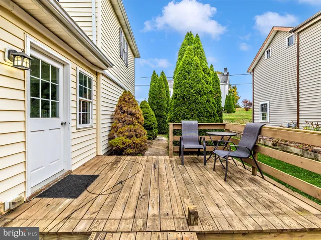 a view of outdoor sitting area with furniture