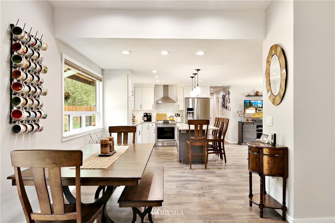 1064 West Laurel Road Ferndale, WA 98248 - Photo 15 of 39 a view of a dining room with furniture window and outside view