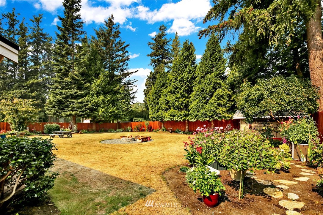 1064 West Laurel Road Ferndale, WA 98248 - Photo 26 of 39 a view of a garden with plants