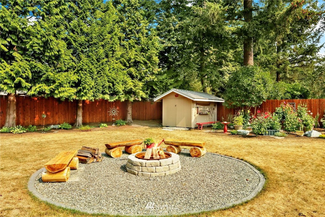 1064 West Laurel Road Ferndale, WA 98248 - Photo 29 of 39 a view of a swimming pool with a patio