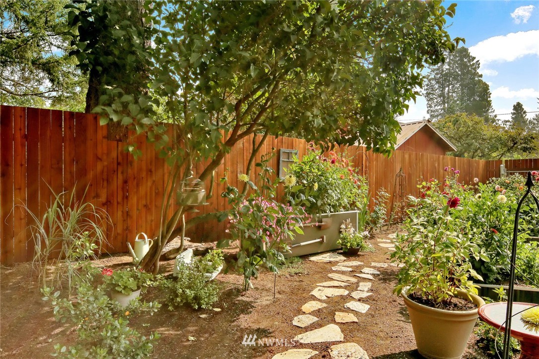 1064 West Laurel Road Ferndale, WA 98248 - Photo 36 of 39 a view of a backyard with plants