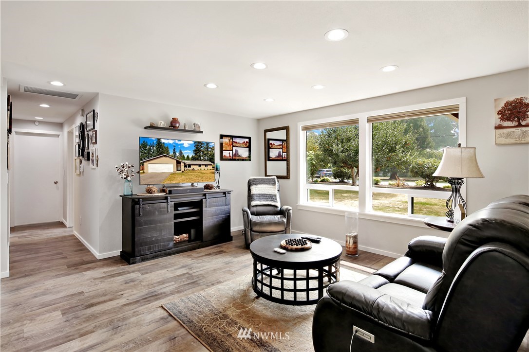 1064 West Laurel Road Ferndale, WA 98248 - Photo 6 of 39 a living room with furniture and a large window