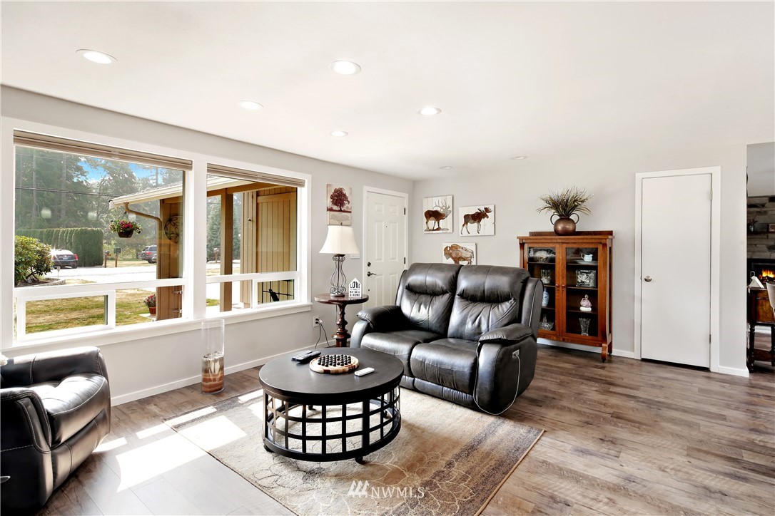 1064 West Laurel Road Ferndale, WA 98248 - Photo 7 of 39 a living room with furniture and a large window
