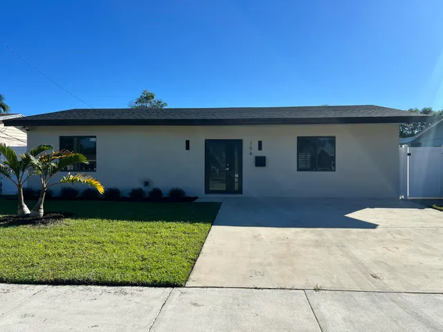a front view of house with yard