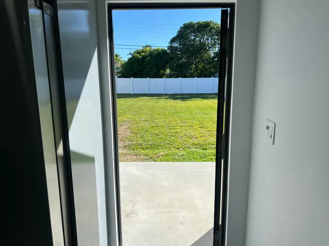 a view of a pool with a yard