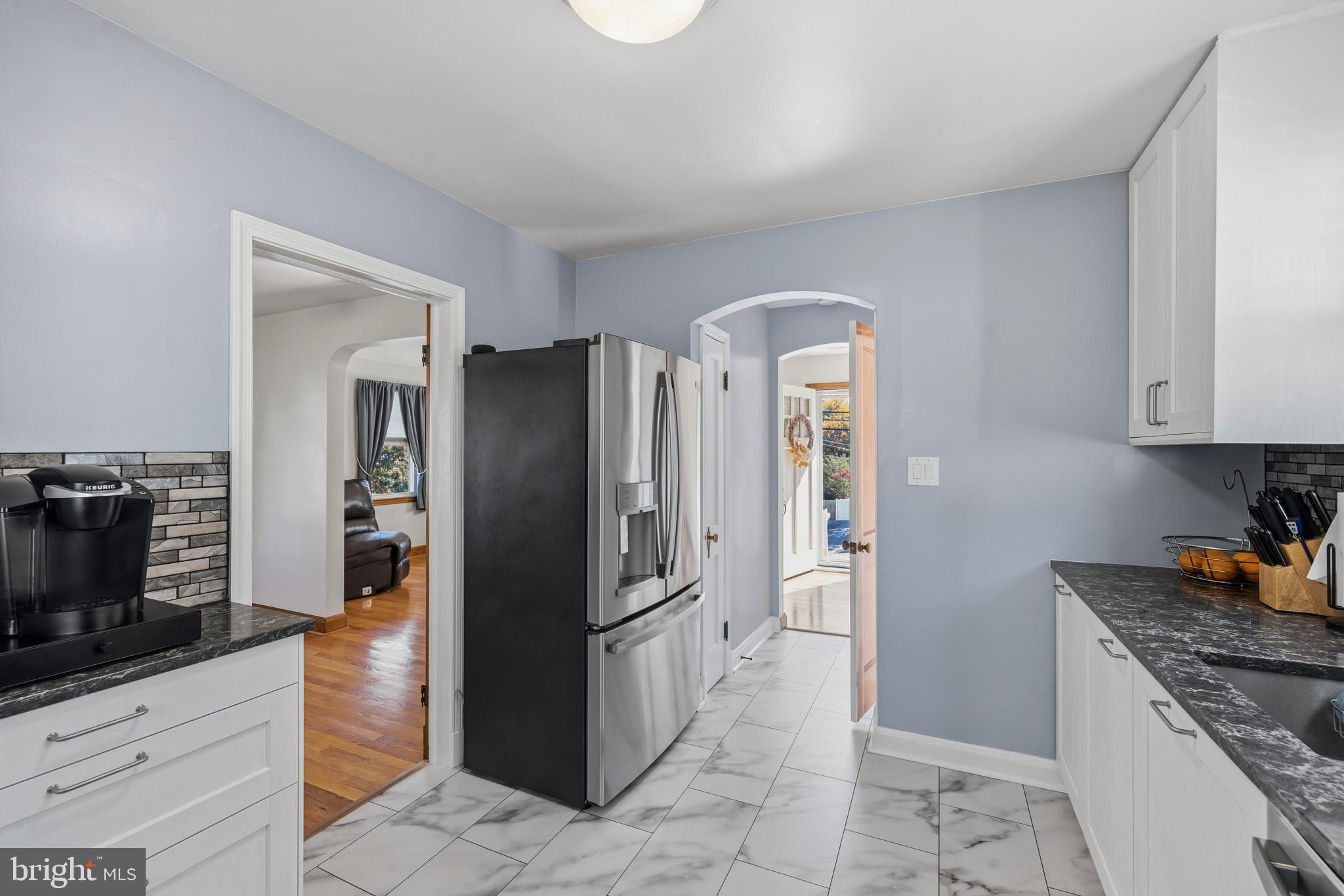 1246 Elm Road Baltimore, MD 21227 - Photo 8 of 27 Kitchen opens to foyer and dining room