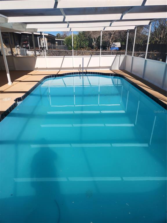 4462 Cynthia Lane Spring Hill, FL 34606 - Photo 18 of 22 a view of a swimming pool