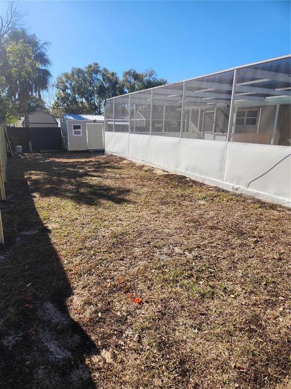 4462 Cynthia Lane Spring Hill, FL 34606 - Photo 22 of 22 a view of a house with a yard