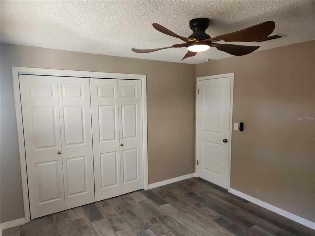 4462 Cynthia Lane Spring Hill, FL 34606 - Photo 7 of 22 a view of an empty room