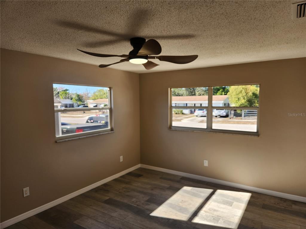 4462 Cynthia Lane Spring Hill, FL 34606 - Photo 10 of 22 a view of an empty room with a window