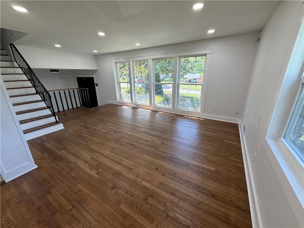 3763 Elkridge Drive Decatur, GA 30032 - Photo 3 of 20 an empty room with wooden floor and windows
