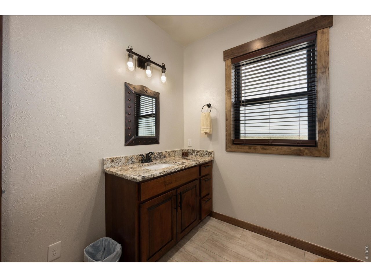 8626 County Road 22 Fort Lupton, CO 80621 - Photo 25 of 50 a kitchen with a stove and a microwave