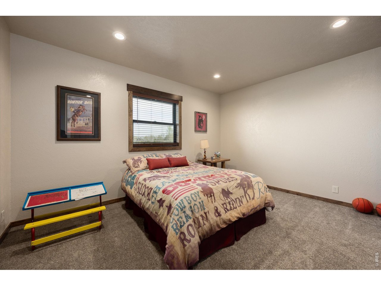 8626 County Road 22 Fort Lupton, CO 80621 - Photo 28 of 50 a bedroom with a bed and a dresser