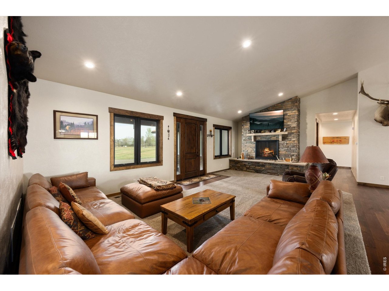 8626 County Road 22 Fort Lupton, CO 80621 - Photo 5 of 50 a living room with furniture and a window